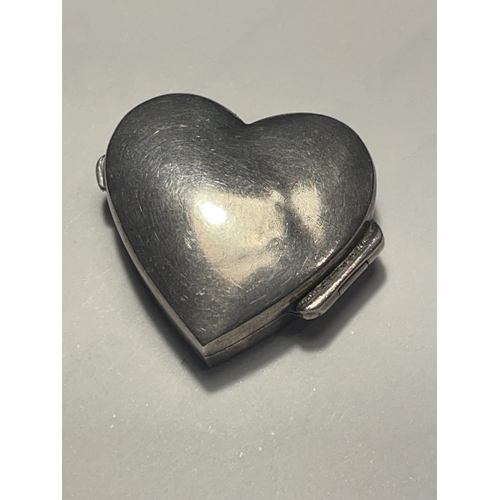 611 - A MARKED SILVER HEART SHAPED PILL BOX