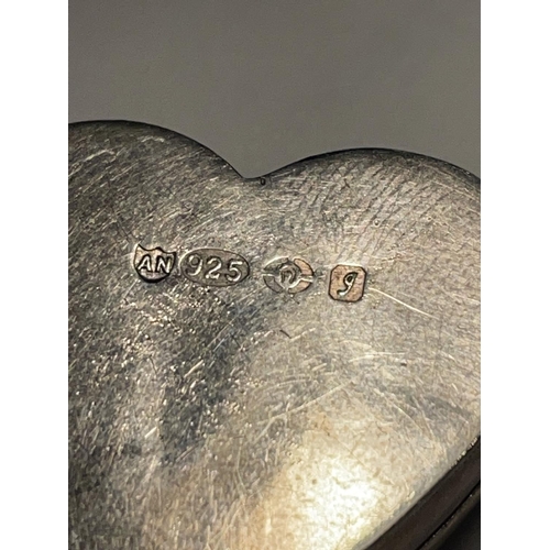 611 - A MARKED SILVER HEART SHAPED PILL BOX