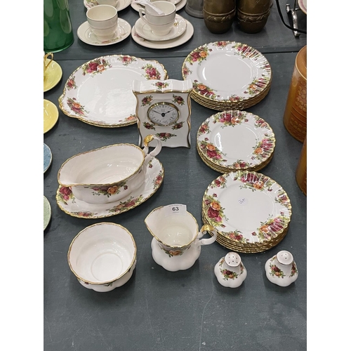 63 - A QUANTITY OF ROYAL ALBERT 'OLD COUNTRY ROSES' TO INCLUDE A CLOCK, CAKE PLATES, SIDE PLATES, SAUCE B... 