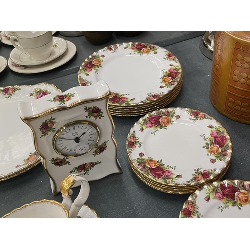 63 - A QUANTITY OF ROYAL ALBERT 'OLD COUNTRY ROSES' TO INCLUDE A CLOCK, CAKE PLATES, SIDE PLATES, SAUCE B... 