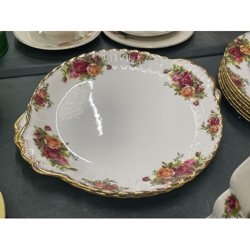 63 - A QUANTITY OF ROYAL ALBERT 'OLD COUNTRY ROSES' TO INCLUDE A CLOCK, CAKE PLATES, SIDE PLATES, SAUCE B... 