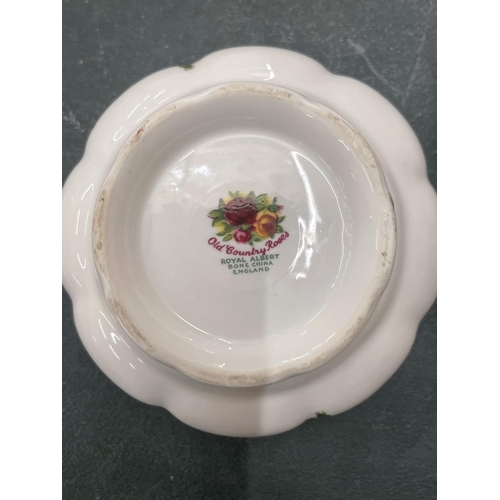 63 - A QUANTITY OF ROYAL ALBERT 'OLD COUNTRY ROSES' TO INCLUDE A CLOCK, CAKE PLATES, SIDE PLATES, SAUCE B... 