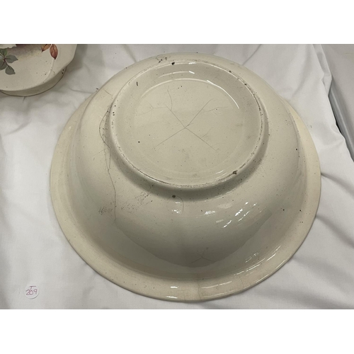 74 - A LARGE TOILET JUG AND BOWL WITH FLORAL DECORATION