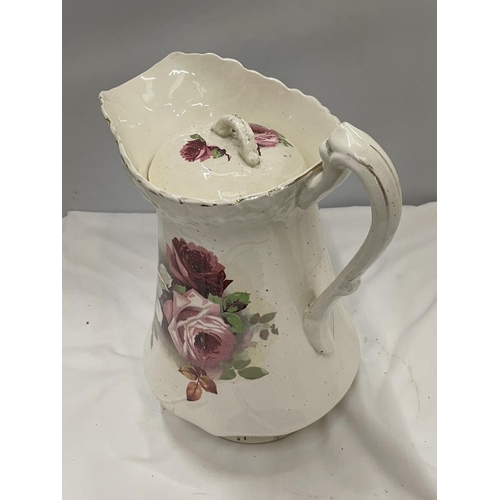 74 - A LARGE TOILET JUG AND BOWL WITH FLORAL DECORATION