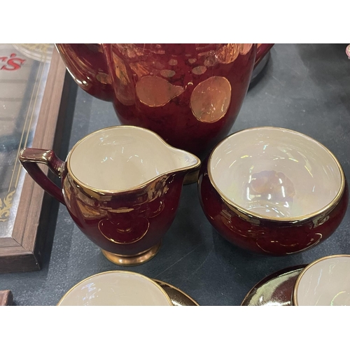 76 - A CARLTON WARE ROUGE ROYALE COFFEE SET TO INCLUDE COFFEE SET, SUGAR BOWL, CREAM JUG, CUPS AND SAUCER... 