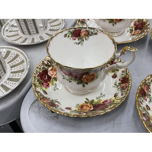 82 - A QUANTITY OF ROYAL ALBERT 'OLD COUNTRY ROSES' TEAWARE TO INCLUDE PLATES, CUPS, SAUCERS, CREAM JUG A... 