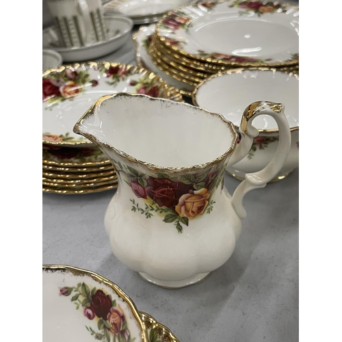 82 - A QUANTITY OF ROYAL ALBERT 'OLD COUNTRY ROSES' TEAWARE TO INCLUDE PLATES, CUPS, SAUCERS, CREAM JUG A... 