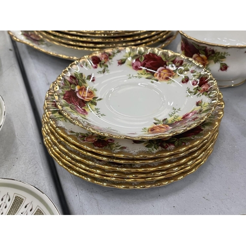 82 - A QUANTITY OF ROYAL ALBERT 'OLD COUNTRY ROSES' TEAWARE TO INCLUDE PLATES, CUPS, SAUCERS, CREAM JUG A... 