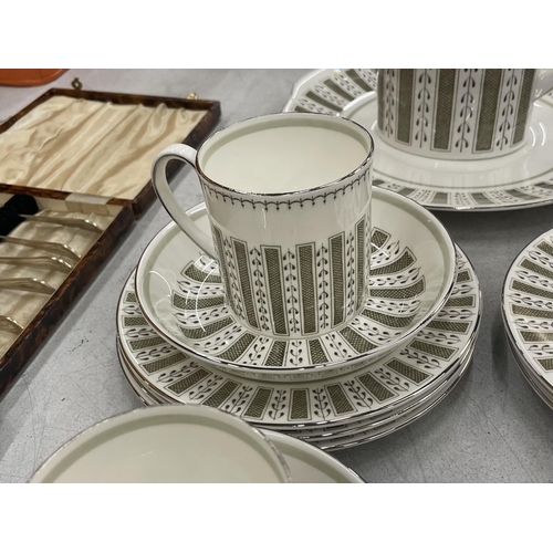 83 - A SUSIE COOPER 'PERSIA' COFFEE SET TO INCLUDE A COFFEE POT, CUPS, SAUCERS, SIDE PLATES, CREAM JUGS A... 