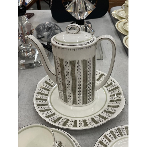 83 - A SUSIE COOPER 'PERSIA' COFFEE SET TO INCLUDE A COFFEE POT, CUPS, SAUCERS, SIDE PLATES, CREAM JUGS A... 