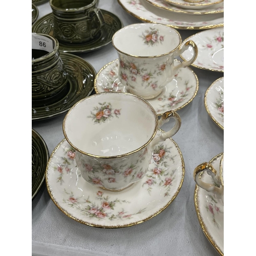 85 - A LARGE QUANTITY OF PARAGON/ROYAL ALBERT 'VICTORIANA ROSE' TO INCLUDE TUREENS, CUPS, SAUCERS, PLATTE... 