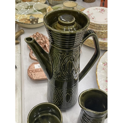 86 - AN ELLGREAVE POTTERY SAXONY DARK GREEN COFFEE SET TO INCLUDE A COFFEE POT, CREAM JUG, SUGAR BOWL, CU... 