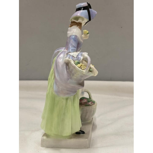 876 - A ROYAL DOULTON FIGURINE SPRING FLOWERS HN 1807