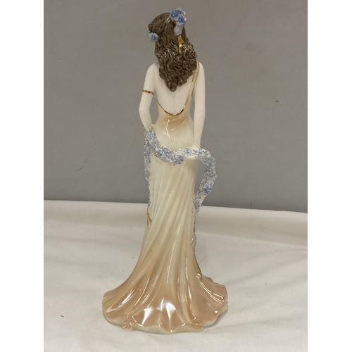 879 - A LIMITED EDITION COALPORT FIGURE TOPAZ 1104/9500