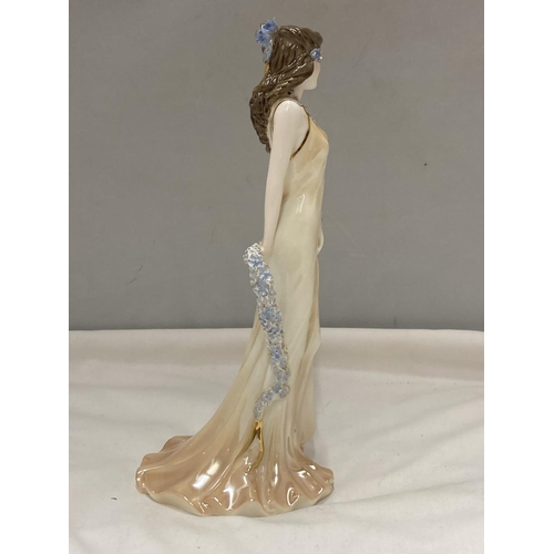 879 - A LIMITED EDITION COALPORT FIGURE TOPAZ 1104/9500