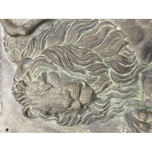 93 - A LARGE RECONSTITUTED STONE PLAQUE OF A VENETIAN LION 72CM X 54CM