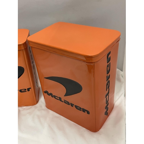 99 - TWO ORANGE McCLAREN STORAGE TINS