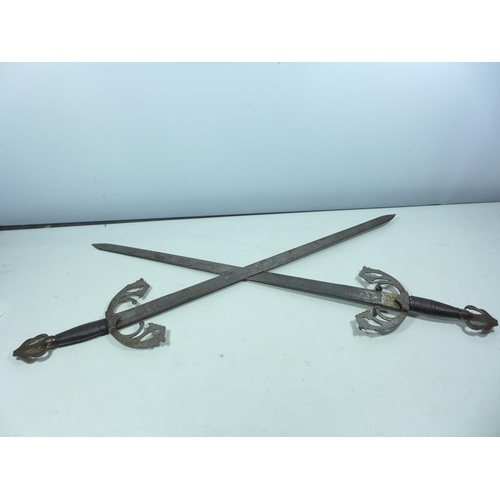 413 - A PAIR OF SPANISH MADE SWORDS 60CM BLADES