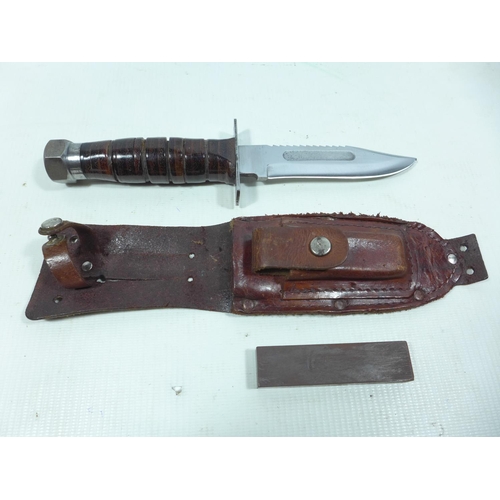 416 - A JAPANSES JET PILOT MARKED BOWIE KNIFE AND LEATHER SCABBARD 11.5CM SAWBACK BLADE