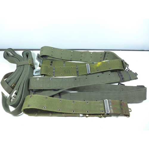 425 - FIVE MILITARY GREEN WEBBING BELTS AND TWO SETS OF STRAPS