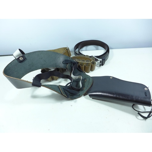 427 - A BLACK LEATHER SHOULDER HOLSTER, CARTRIDGE BELT AND ANOTHER BELT