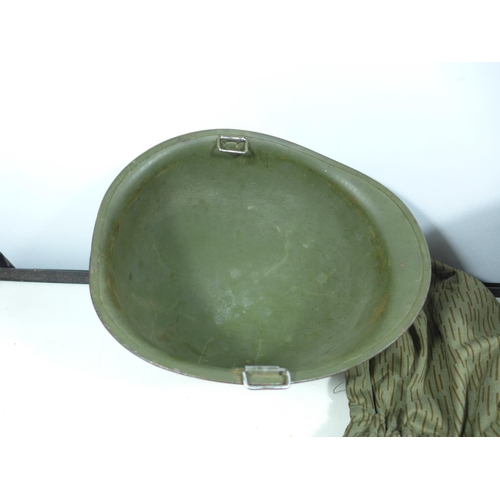 438 - A GERMAN METAL HELMET AND LINER, GREEN PAINTED METAL HELMET AND A CAMOUFLAGE HOOD