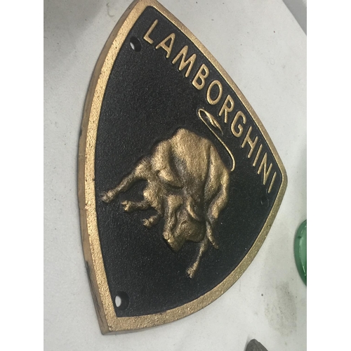 127 - A CAST SHIELD SHAPED LAMBORGHINI SIGN 19CM X 22CM