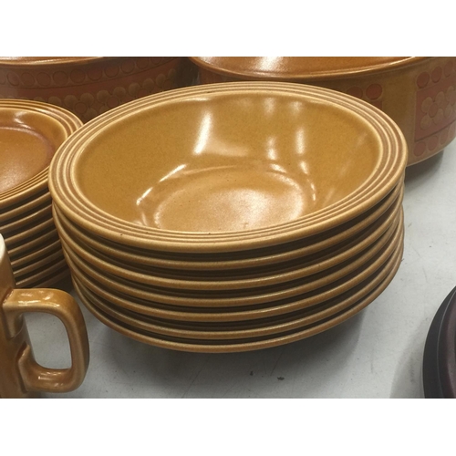 130 - A QUANTITY OF HORNSEA POTTERY 'SAFFRON' TO INCLUDE BOWLS, TUREENS, PLATES AND A MILK JUG