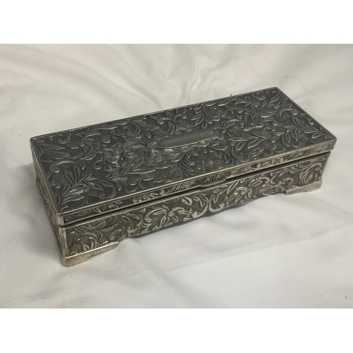 151 - A SILVER PLATED JEWELLERY BOX WITH EMBOSSED DETAIL TO INCLUDE A QUANTITY OF COSTUME JEWELLERY