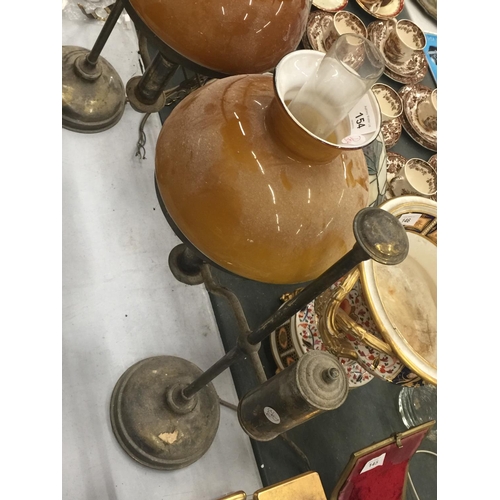 154 - A PAIR OF VINTAGE BRASS OIL LAMPS WITH AMBER GLASS SHADES CONVERTED TO ELECTRICITY - WILL NEED REWIR... 