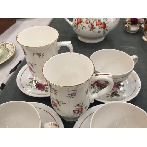 206 - A QUANTITY OF CHINA CUPS AND SAUCERS TO INCLUDE CROWN STAFFORDSHIRE 'DENBIGH', ROYAL VICTORIA, ETC