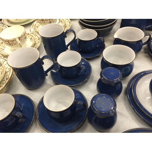 207 - A DENBY DINNER SERVICE IN BLUE TO INCLUDE PLATES, BOWLS, TEAPOTS, SERVING TUREEN, MILK JUGS, SUGAR B... 