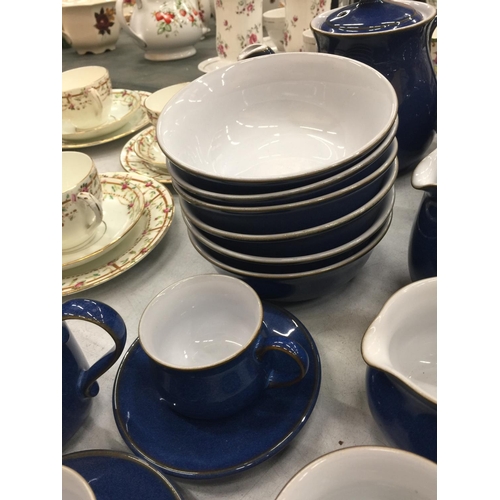 207 - A DENBY DINNER SERVICE IN BLUE TO INCLUDE PLATES, BOWLS, TEAPOTS, SERVING TUREEN, MILK JUGS, SUGAR B... 