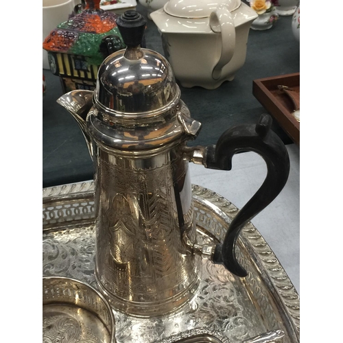 211 - A QUANTITY OF SILVER PLATED ITEMS TO INCLUDE A GALLERIED TRAY, FOOTED TRAY, A COFFEE POT, TEAPOT, SU... 