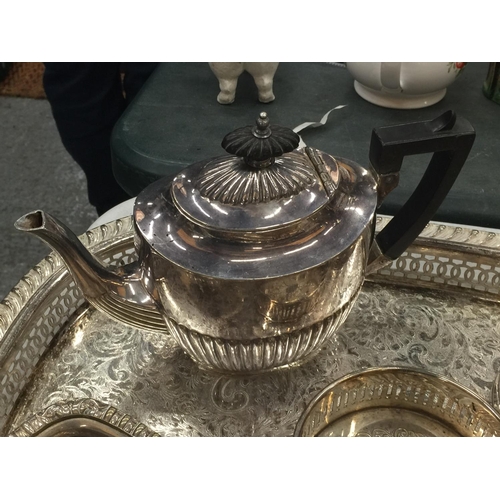 211 - A QUANTITY OF SILVER PLATED ITEMS TO INCLUDE A GALLERIED TRAY, FOOTED TRAY, A COFFEE POT, TEAPOT, SU... 