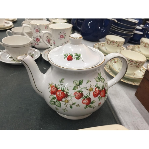 213 - FOUR COLLECTABLE TEAPOTS TO INCLUDE SADLER STRAWBERRY, SADLER HEXAGON SHAPE, ETC