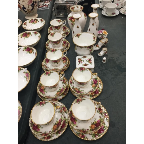 214 - A LARGE QUANTITY OF ROYAL ALBERT 'OLD COUNTRY ROSES' TO INCLUDE DINNER PLATES, SERVING PLATE, BOWLS,... 