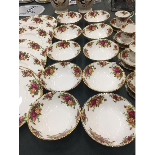 214 - A LARGE QUANTITY OF ROYAL ALBERT 'OLD COUNTRY ROSES' TO INCLUDE DINNER PLATES, SERVING PLATE, BOWLS,... 