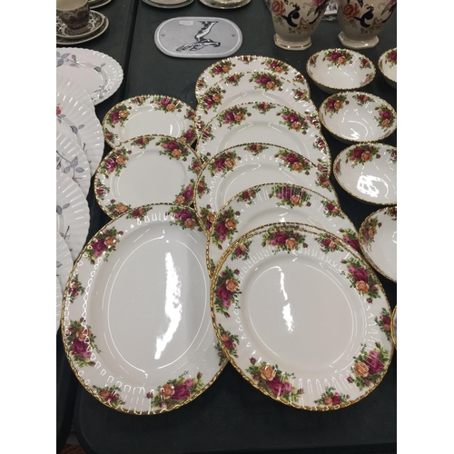 214 - A LARGE QUANTITY OF ROYAL ALBERT 'OLD COUNTRY ROSES' TO INCLUDE DINNER PLATES, SERVING PLATE, BOWLS,... 