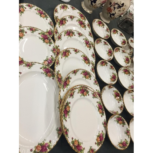 214 - A LARGE QUANTITY OF ROYAL ALBERT 'OLD COUNTRY ROSES' TO INCLUDE DINNER PLATES, SERVING PLATE, BOWLS,... 