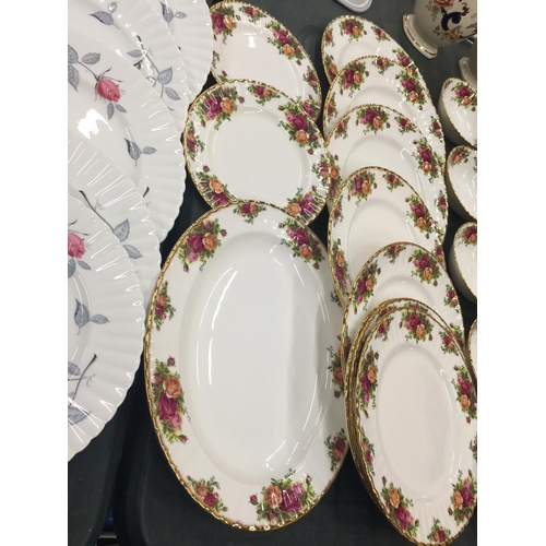 214 - A LARGE QUANTITY OF ROYAL ALBERT 'OLD COUNTRY ROSES' TO INCLUDE DINNER PLATES, SERVING PLATE, BOWLS,... 