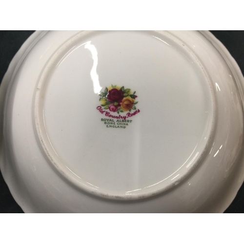 214 - A LARGE QUANTITY OF ROYAL ALBERT 'OLD COUNTRY ROSES' TO INCLUDE DINNER PLATES, SERVING PLATE, BOWLS,... 