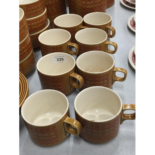 226 - A QUANTITY OF HORNSEA POTTERY 'SAFFRON' TO INCLUDE STORAGE JARS, BOWLS, CUPS, ETC