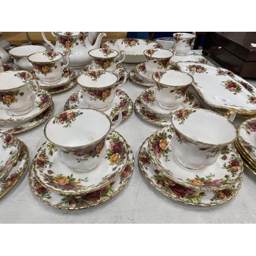 10 - A LARGE COLLECTION OF ROYAL ALBERT OLD COUNTRY ROSES TO INCLUDE TRIOS, CAKE PLATE, SANDWICH PLATES E... 
