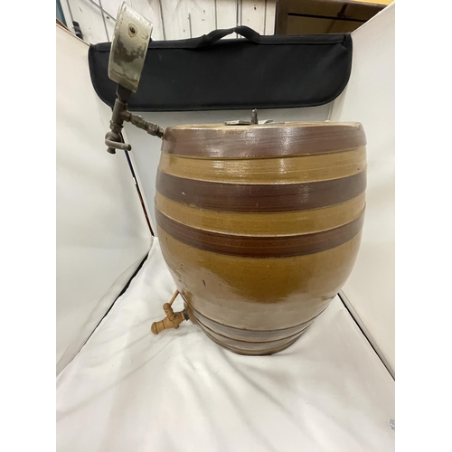 14 - A LARGE STONEWARE BARREL WITH A WOODEN TAP AND A BOC GAUGE HEIGHT