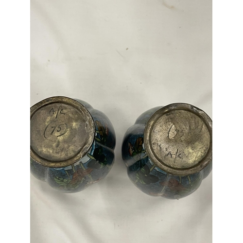 17 - A PAIR OF CLOISONNE VASES WITH FLOWER AND BUTTERFLY DECORATION MARKED A/C 75 HEIGHT 15.5CM