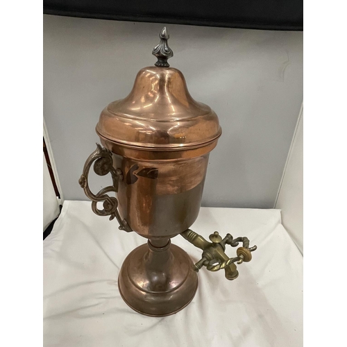 18 - A VINTAGE COPPER AND BRASS URN WITH TAP AND A COPPER BOWL