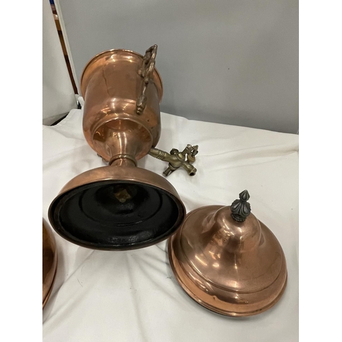 18 - A VINTAGE COPPER AND BRASS URN WITH TAP AND A COPPER BOWL