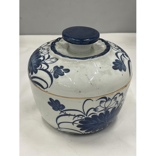 3 - A BLUE AND WHITE ORIENTAL STYLE LIDDED POT
