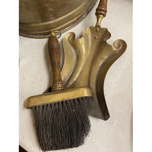 42 - VARIOUS BRASS ITEMS TO INCLUDE A LARGE COAL BUCKET, UNUSUAL SHOVEL, BRUSH, TONGS AND FIRE DOGS